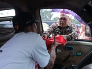 Bagikan Ribuan Bendera, Pj Walikota Ajak Masyarakat Nyalakan Semangat Kemerdekaan