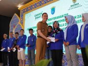 Pemkab dan Baznas OKI Salurkan ZIS Untuk 356 Petugas Kebersihan