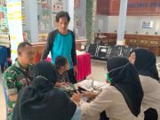 Babinsa Koramil Tanjung Batu Dampingi Anak Sekolah dengan Kendala Pendengaran dan Bicara