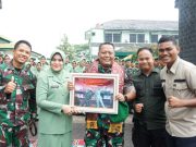 Tradisi Pedang Pora Iringi Serah Terima Jabatan Dandim 0402/OKI-OI