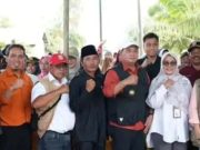 Ketua Komisi II DPRD Banyuasin Hadiri Panen Padi IP 100 di Selat Penuguan